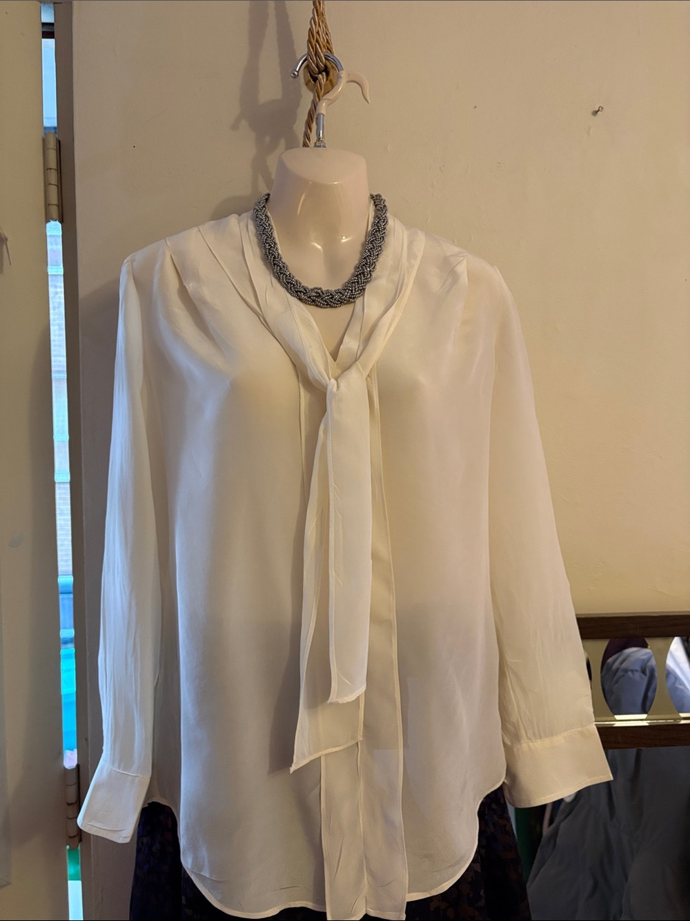 Ivory Tie-Neck Blouse with Long Sleeves100. Silk